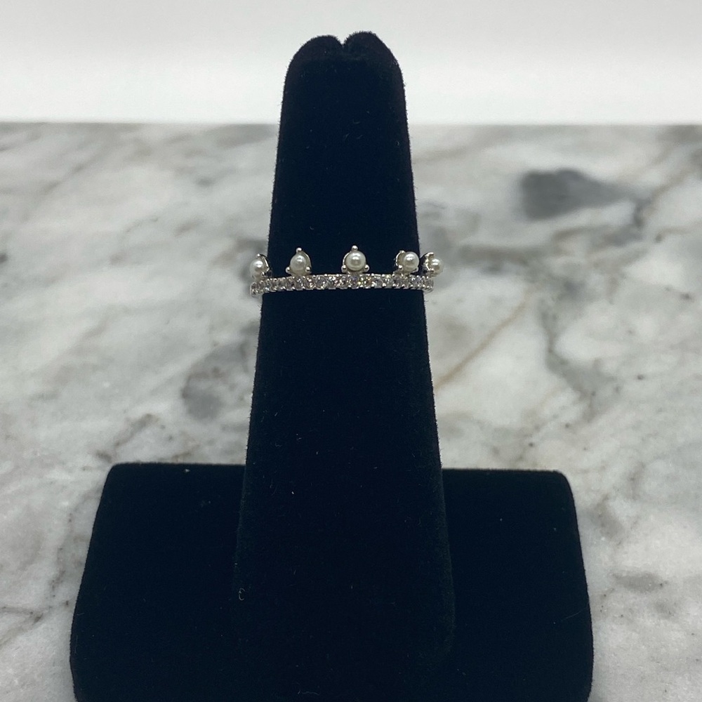 Elegant Silver Ring with Prong-Set Pearls